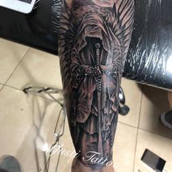 Yusti Tattoo