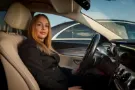 buds-cab-female-chauffeur-driving-premium-sedan