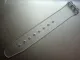 curea swatch alb-transparet de 17 mm, latime, partea cu gauri.